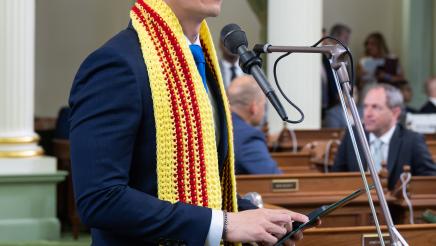 Photo on Assembly floor: Assemblymember Evan Low speaking on ACR-195 recognizing the Vietnamese Traditional and Freedom Flag