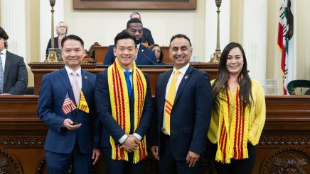 Photo on Assembly floor: Assemblymembers Tri Ta, Evan Low, Ash Kalra and Stephanie Nguyen