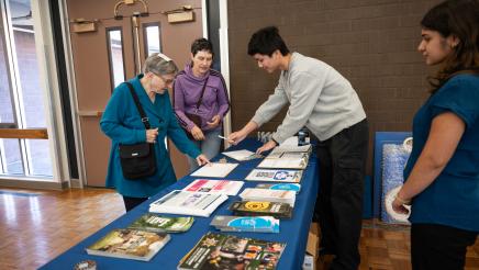 Guests checking in at the event table