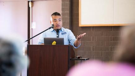 Guest speaker speaking on the podium