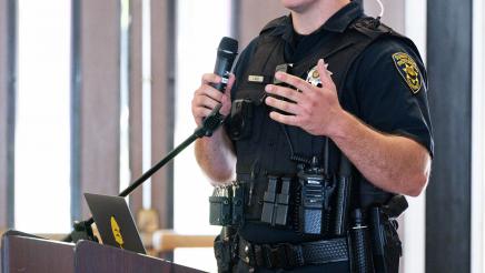 Sunnyvale Police Officer speaking on the podium