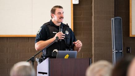 Sunnyvale Police Officer speaking on the podium