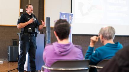 Sunnyvale Police Officer speaking on the podium