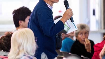 Attendee speaking at the event