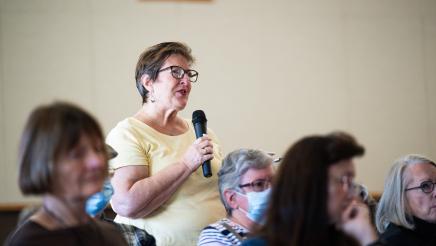 Attendee speaking at the event