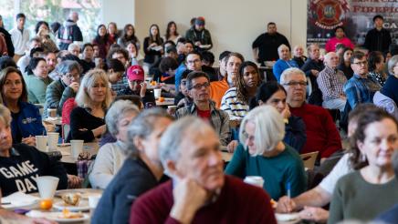 Wide photo of the event by Asm. Ahrens Policy and Pancakes