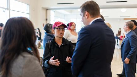 Asm. Ahrens speaking with constituents at the event