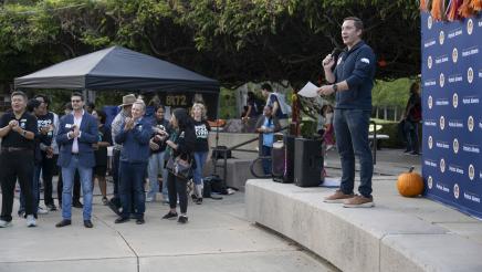 Asm. Ahrens remarks Fall Harvest Festival photo with guests